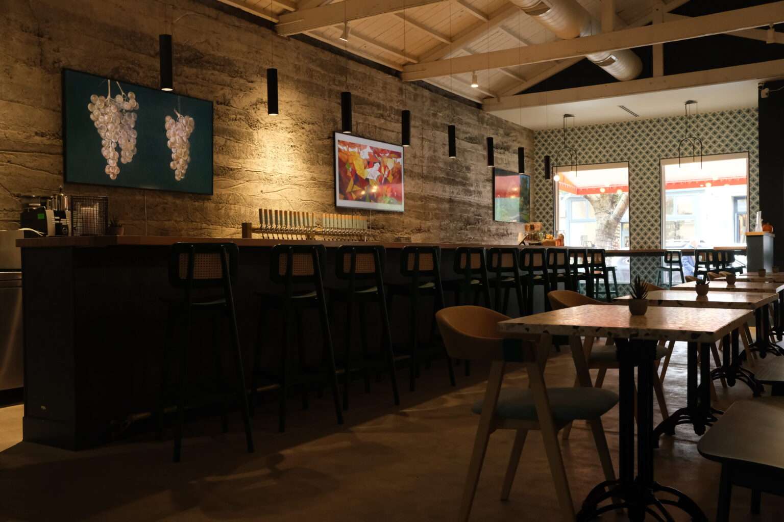 Interior of the Tap House showcasing the bar area, taps and seating